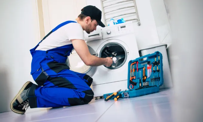 machine à laver donnant des décharges électriques